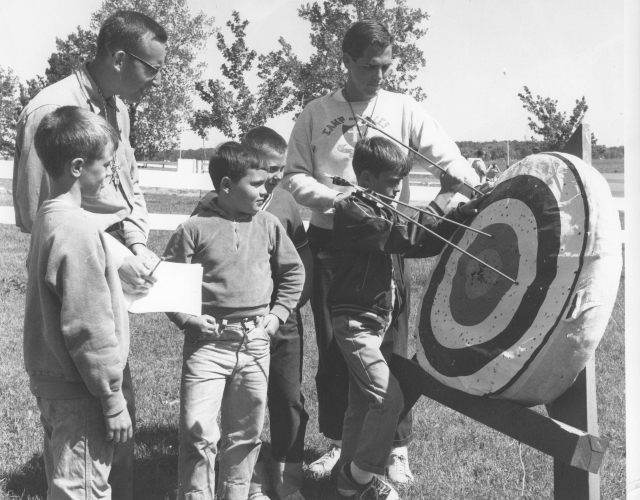 DeSales: Frank DeMilde & Dave Whalen
on archery range with campers