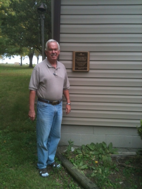 Fr. Jim McHugh, Dir. Camp De Sales w/Beetle Bailey Plaque